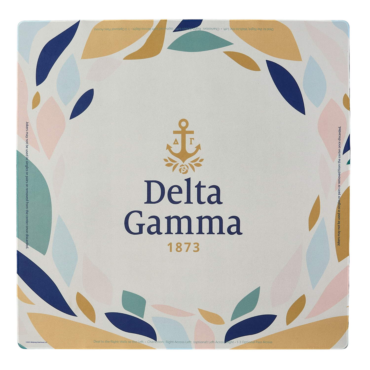 Delta Gamma mahjong mat with colorful leaf design